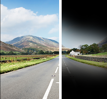 An image of a landscape with a road running through, split into two. One side shows a clear view, and the other shows black shadows at the top and bottom of the image, obscuring the view.